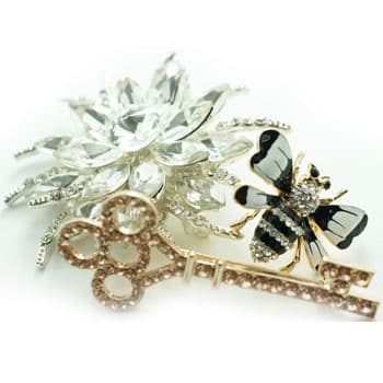 Crystal flower brooch with bee